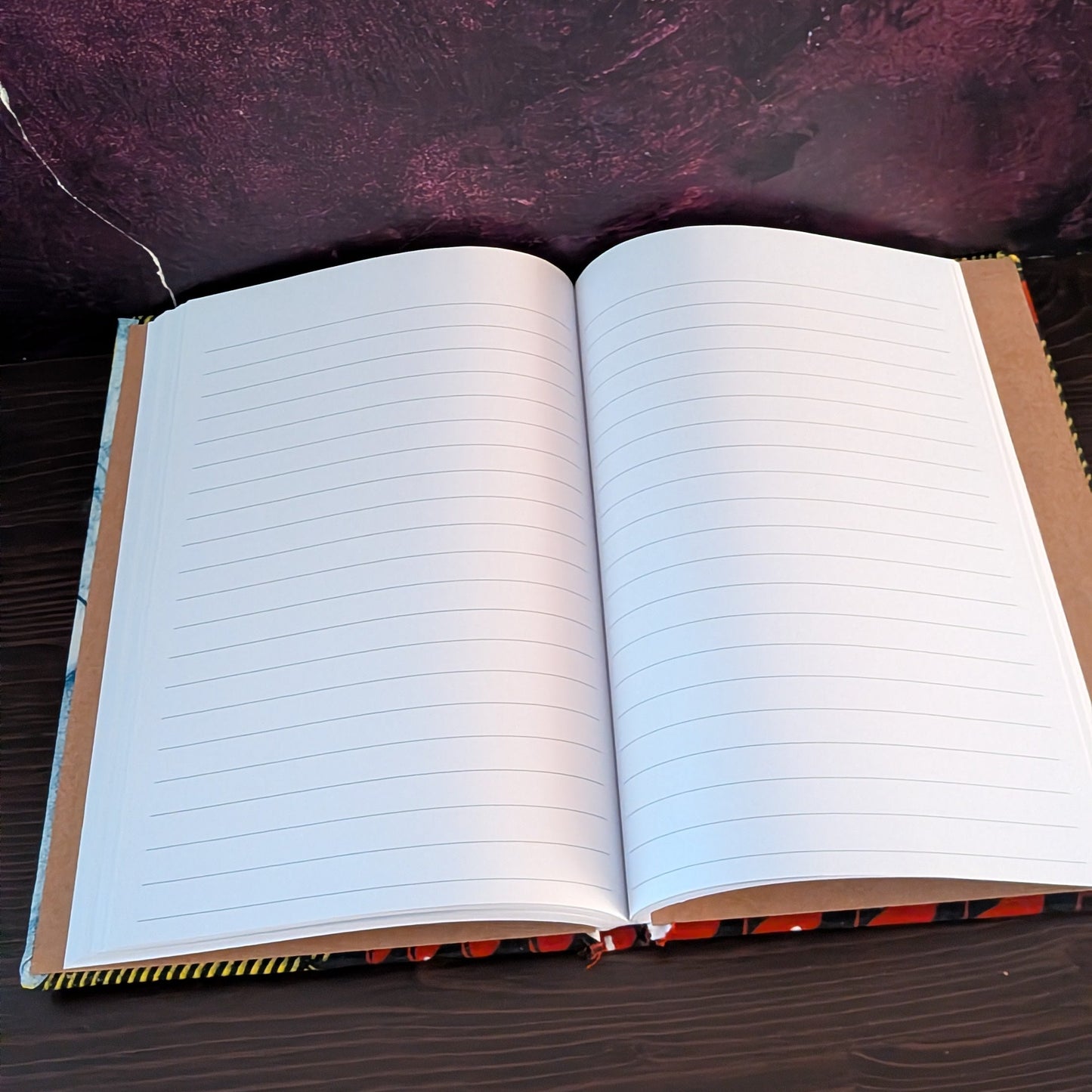 African Patterned A5 Lined Notebook FIOFIO: Mustard with blue red white pigeon pea pods
